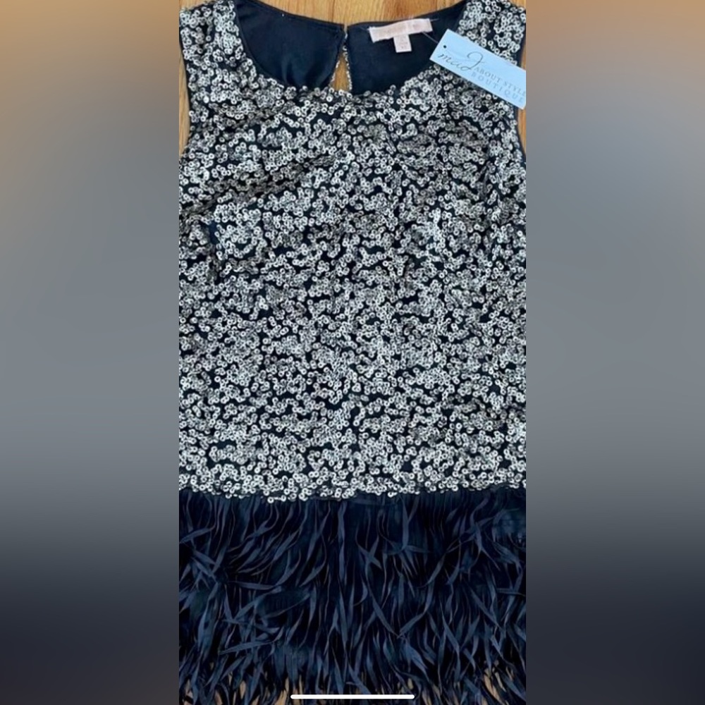 Sequin style from mad about style boutique brand new with tag.